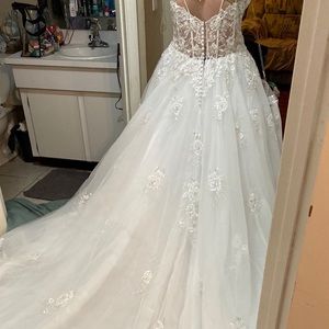So 18 never worn unaltered wedding dress